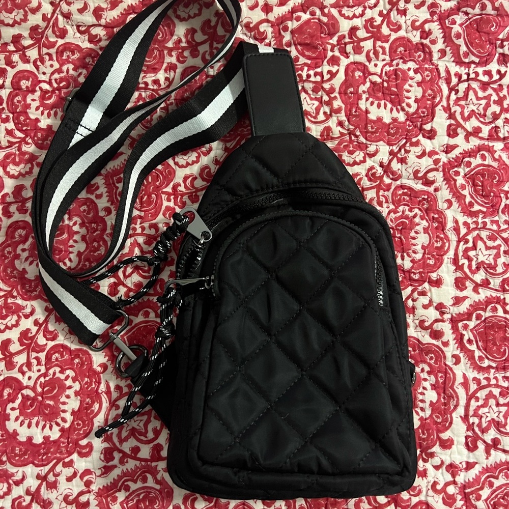 Black quilted crossbody bag backpack